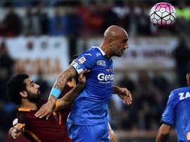 Empolis forward Massimo Maccarone (R) vies with Romas midfielder Mohamed Salah during the Italian Serie A football match October 17, 2015