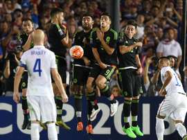 Mexico block a free kick during their 2015 CONCACAF Cup game against the US at the Rose Bowl in Pasadena, California on October 10, 2015