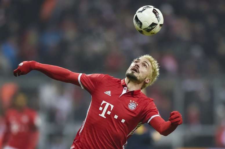 Bayern Munichs defender Mats Hummels in action during the German first division Bundesliga football match FC Bayern Munich vs RB Leipzig in Munich, Germany, on December 21, 2016