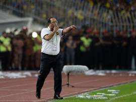 The coach of Malaysias national football team, Dollah Salleh, has announced his resignation after his squad was thrashed 10-0 by the United Arab Emirates