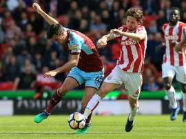 Joe Allen in action against Burnley. AFP