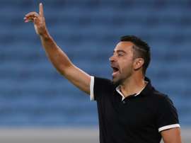 Xavi's Al Sadd hold Duhail, Gomis hits hat-trick for Hilal.