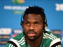 Nigerias defender Joseph Yobo answers a question during a press conference before a training session at the Pantanal Arena in Cuiaba, Brazil on June 20, 2014