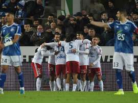 Lyon are just two points off third after coming from behind to defeat Strasbourg. AFP