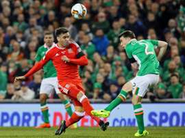 Seamus Coleman challenged by Wales' Hal Robson Kanu. AFP