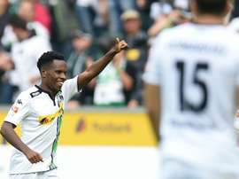 Moenchengladbachs midfielder Ibrahima Traore celebrates during a German first division Bundesliga football match against Wolfsburg in Moenchengladbach, western Germany, on October 3, 2015