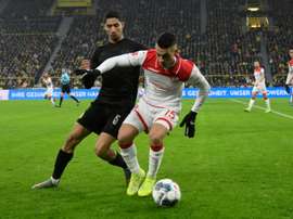 Thommy (R) got a vital late winner for Dusseldorf. AFP