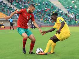 Moroccan Zakaria Hadraf (L) and Togolese Ayayi Zonor contest possession. aFP