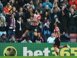Austin swept home from Nathan Redmond's cross. AFP