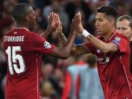 Liverpool forward Roberto Firmino (right) replaces Daniel Sturridge during the Champions League match against Paris Saint-Germain