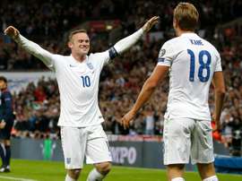 Rooney and Kane pictured in 2015. AFP