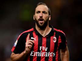Gonzalo Higuain scored twice as Milan beat Chievo 3-1. AFP