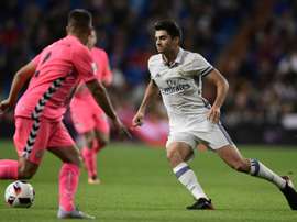 Real Madrids midfielder Enzo Zidane (R) vies with Cultural Leonesas defender Angel Bastos during the Spanish Copa del Rey (Kings Cup) Round of 32 second leg football match Real Madrid CF vs Cultural y Deportiva Leonesa on November 30, 2016