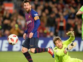 Lionel Messi scoring in Barcelonas Copa del Rey win over Levante on Thursday. AFP