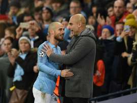 Para Guardiola, David Silva tem as qualidades necessárias para se tornar treinador. AFP