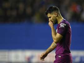 Agüero e adepto do Wigan envolveram-se numa briga. EFE