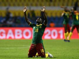 Cameroon's Robert Ndip Tambe celebrates at the end of their match against Guinea-Bissau. AFP