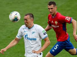 Artem Dzyuba (L) got two in Zenit's 2-4 win at Krasnodar. AFP