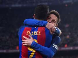 Les joueurs du FC Barcelone, Leo Messi et Luis Suarez célèbrent un but en Liga. AFP