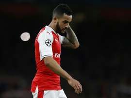 Walcott pictured after a 5-1 defeat to Bayern Munich in the Champions League. AFP