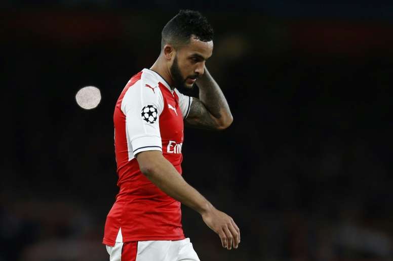 Walcott pictured after a 5-1 defeat to Bayern Munich in the Champions League. AFP