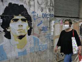 Maradona pleads for 'Hand of God' to end pandemic. AFP