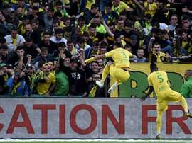 Diego Carlos celebrates after the second goal. AFP