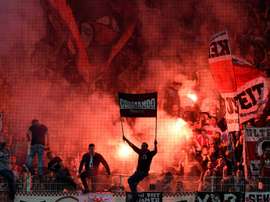 Volunteers and virtual beer: German fans take fight to virus. AFP