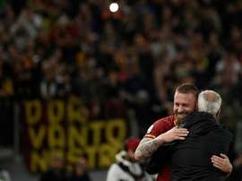 De Rossi wore bizarre outfit as he watched Rome derby in the stands. AFP