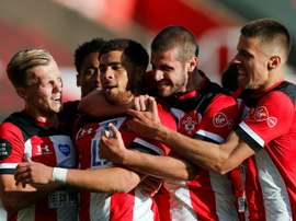 Che Adams (C) gave Southampton a 1-0 win v Man City. AFP