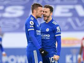 Jamie Vardy's (L) deflected effort saw Leicester get a share of the spoils v Man Utd. AFP