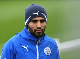 Wes Morgan says that Riyad Mahrez is continuing to work hard amid talk of a move to Roma. AFP