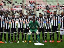 Players of TP Mazembe pose on the pitch prior to their Club World Cup fifth place play-off match against Club America in December 2015