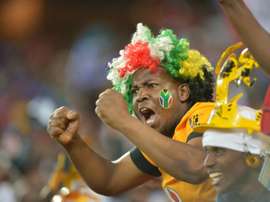 Orlando Pirates supporters celebrate in Soweto on November 2, 2013