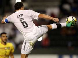 Xavi se formera au Qatar. AFP
