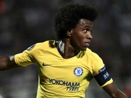 Willian celebrates scoring the only goal of the game in Greece. AFP