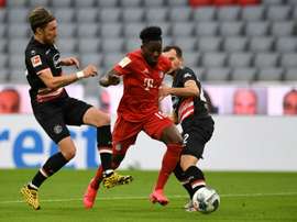 'Road Runner' Davies dazzles as Flick betters Guardiola's Bayern record. AFP