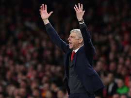 Wenger certainly believed that Arsenal should have been awarded a penalty. AFP