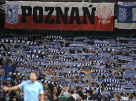 Lech Poznan fans cheer their team during the UEFA Europa League group A football match against Manchester City at The City of Manchester stadium, Manchester, England on October 21, 2010
