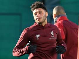 ALex Oxlade-Chamberlain is back on the Liverpool bench. AFP