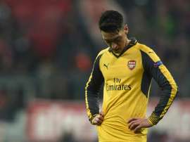 Mesut Ozil reacts during the UEFA Champions League. AFP