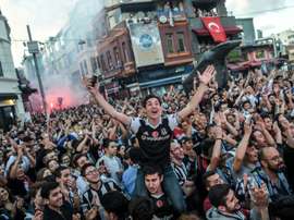 Besiktas fans celebrating the victory of the Turkish league. AFP
