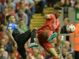 Le défenseur central souhaite rester à Liverpool la saison prochaine. AFP