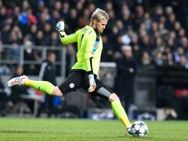 Kasper Schmeichel passes the ball during the match between FC Copenhagen and Leicester City. AFP