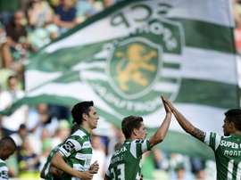 Sporting Lisbons players celebrate after scoring a goal during a Portuguese league match at the Jose Alvalade stadium in Lisbon, in May 2015