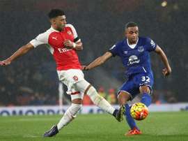 Galloway (R) challenges Oxlade-Chamberlain. AFP