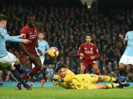 O jogo entre Liverpool e Manchester City foi marcado por polêmicas. AFP