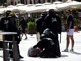 Russians face trial for iron-bar attack on English fan. AFP