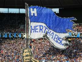 Hetha Berlin supporters cheer prior to a match on August 6, 2011