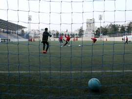 Ahli Al-Khalil football clubs players take part in a training session on April 24, 2015 in the West Bank town of Hebron
